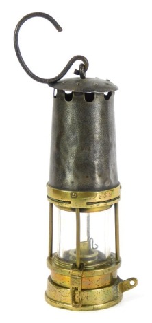 A brass and steel miner's lamp, 24cm high.