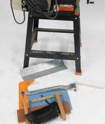 A DeWalt electric planer, serial no 0788189535. WARNING! This lot contains untested or unsafe electrical items. It is supplied for scrap or re-conditioning only. TRADE ONLY - 4