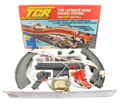 A TCR Total Control Racing JMA car speedway set, boxed.