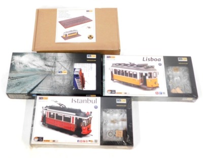 Three Ocio Creativo (Occre) 1:24 scale tram system kits, comprising Tipidabo, Istanbul and Lisboa, and a base. (4)