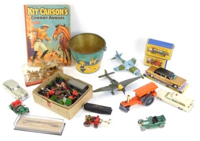 Diecast toys and collectables, two Matchbox models, Y12 and Y11, diecast aeroplanes, poker dice, seaside tin bucket commemorative coach, Britain's plastic soldier figures, kit cars and 1956 Kit Carson's Cowboy Annual and a silver Parker pen. (a quantity)