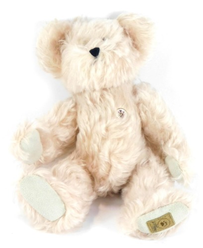 A Boyd's Collection pink Teddy bear, with rose button, 25cm high.