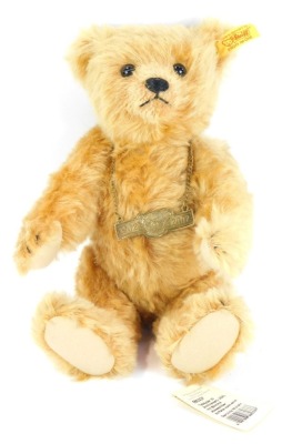 A Steiff 1902-2002 Anniversary Teddy bear, with labels, 25cm high.