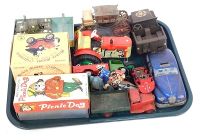 Various tin plate and clockwork toys, comprising a mechanical picnic dog, Mickey Mouse Old Timers, Tri-ang Toys jeep, modern tank, motorbike, bird, tractor, police car, etc., lacking keys. (1 tray)