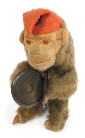 A mechanical monkey with cymbals toy, 18cm high.