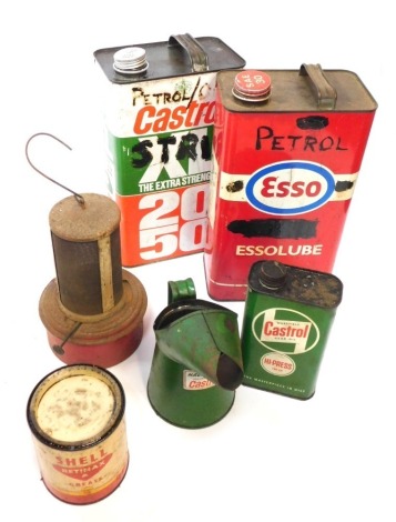 A group of oil cans, comprising a Castrol XL oil can, SO Lube 30 can, Castrol miniature can, Castrol can, carry lamp, and a Shell Motor Grease tin, the largest 29cm high. (6)