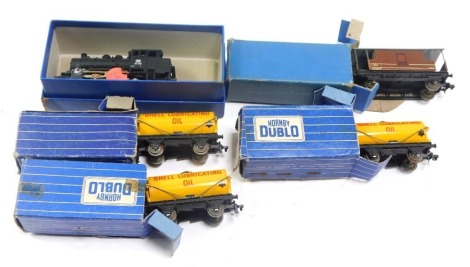 Hornby Dublo wagons, a mineral wagon, Shell Lubricating Oil wagon, goods brake van D1, D1 Shell Lubricating Oil tank wagon, and a Marklin OO gauge locomotive 89006, boxed. (5)