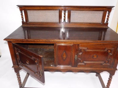 A 1920's barley twist oak sideboard, with caned back, 137cm wide. - 2