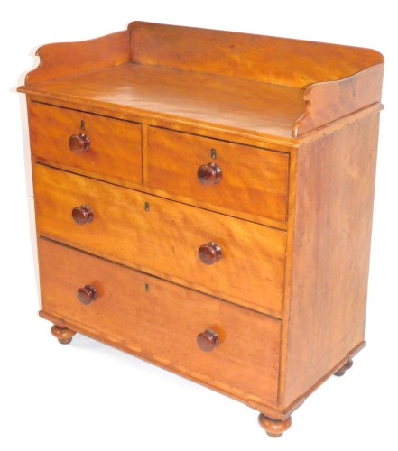 A Victorian satin walnut chest, of two short and two long drawers, with raised gallery and bun feet, 91cm high, 88cm wide, 42cm deep.