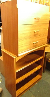 A dressing table with mirror, a bookcase, a three drawer chest with moulded handles and a marble top table. (4)