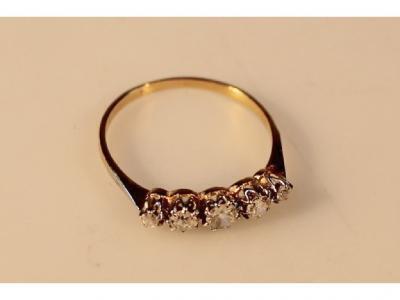 A five stone in line diamond ring