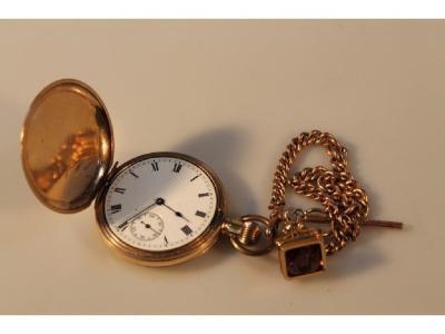 A gold plated Waltham hunter pocket watch