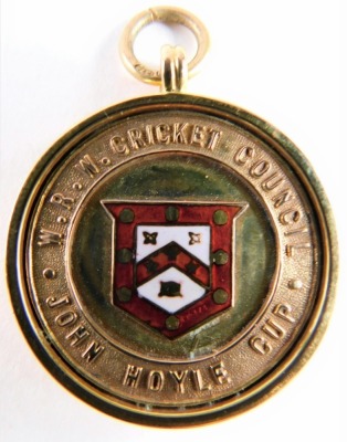 A 9ct gold and enamel cricket medal, centred with a shield and raised W. R. W. Cricket Council John Hoyle Cup, and verso WINNERS 1925 E. HOYLE, 4cm high, 6.9g all in. (cased)