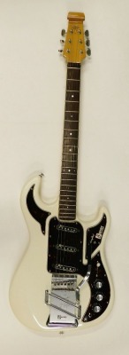 A 2004 Burns The Marvin Hank Marvin Anniversary Edition electric guitar, in white, Stratocaster no. 1706/2004, with certificate, other paperwork and outer case, 99cm long.