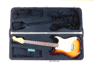 A Fender Stratocaster electric guitar, six string, in cream and vinyl finish, no.323681, 99cm long., cased. - 5