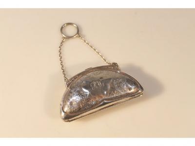 A George V silver ladies purse with sectioned leather interior