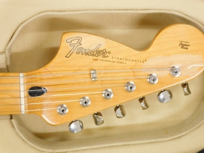 A Fender Stratocaster electric guitar, six string, in cream, no.MZ7010840, 100cm long, cased. - 2