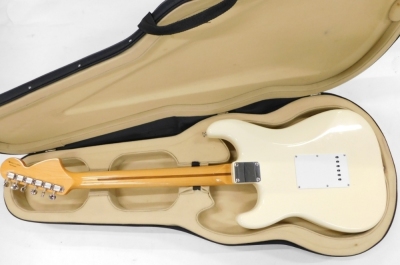 A Fender Stratocaster electric guitar, six string, in cream, no.MZ7010840, 100cm long, cased. - 4