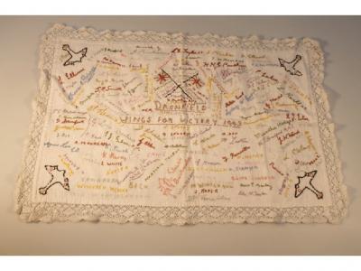 An embroidered tea cloth for Dronfield Airfield