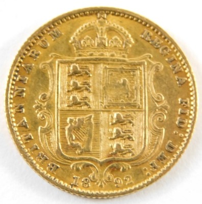 A Victorian shield back half gold sovereign, dated 1892, 5.4g. - 2