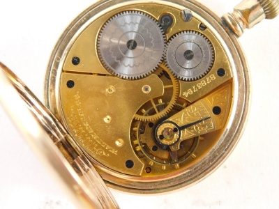 An early 20thC open faced fob watch, with 3cm diameter Roman numeric dial, in engine turned case with vacant cartouche, and a gold plated open faced pocket watch with Roman numeric dial. (2) - 2