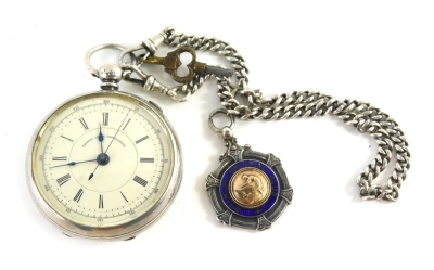 A Victorian silver open faced chronograph, with 4cm diameter Roman numeric and Arabic dial, in a plain case with vacant cartouche attached to an oval watch chain with fob, 1907 SF Plunging, Brambly Swimming Club, 5oz all in.