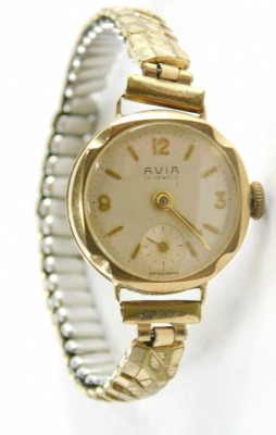 An Avia ladies wristwatch, the 9ct gold circular watch head with seconds dial, on a expanding plated strap, 18g all in. - 2