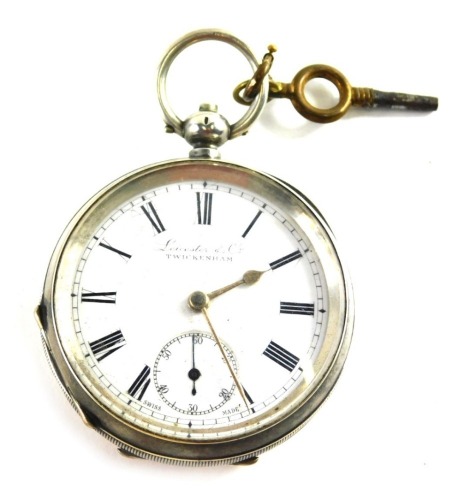 An early 20thC open faced pocket watch, with 5cm diameter Roman numeric dial and subsidiary Arabic second hand, in partially engine turned case with vacant cartouche, marked 0.935, and numbered 452445, with key, 3.5oz all in.