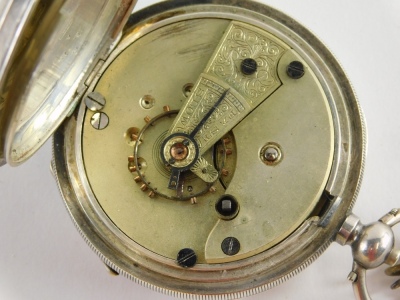 An early 20thC open faced pocket watch, with 5cm diameter Roman numeric dial and subsidiary Arabic second hand, in partially engine turned case with vacant cartouche, marked 0.935, and numbered 452445, with key, 3.5oz all in. - 2