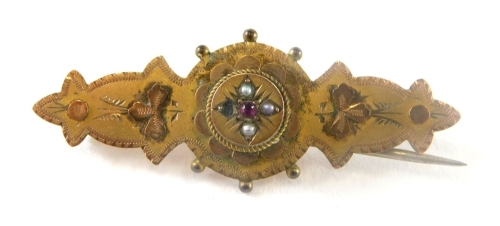 An Edwardian ellipse shaped brooch, set with white and pink stones, with plain pin back, 4cm long.