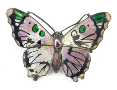 A silver and enamel butterfly brooch, with purple, green and white enamel detail, maker's stamp JA & G, Birmingham 1923, 4cm diameter, 5.8g all in.