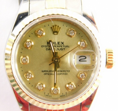 A Rolex Oyster Perpetual Datejust ladies wristwatch, the stainless steel strap with gold coloured dial with diamond set inserts and date aperture, lugs numbered 468B, boxed, with guarantee booklet, 53.1g all in. - 2