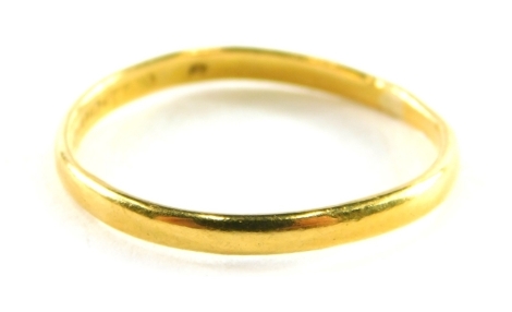 A 22ct gold wedding band, of plain thin design, ring size N, 2.1g all in.