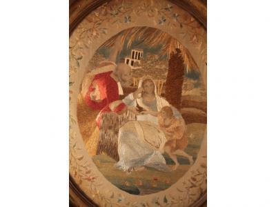 A 19thC silk embroidery depicting a classical scene