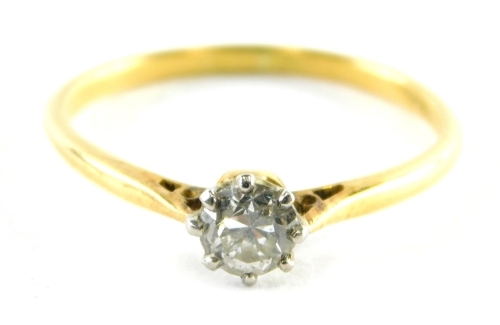 A diamond dress ring, centred with a round brilliant cut diamond, approximately O.08 carats, in claw setting, yellow metal stamped 18 carat plat, ring size O, 1.7g all in.