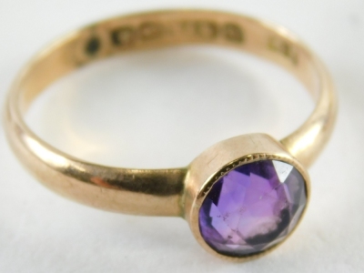 Three items of jewellery, comprising a 9ct gold and amethyst dress ring, ring size I, a yellow metal and enamel gypsy ring, unmarked, ring size I½ and a cultured pearl and paste stone set pin, 4.1g all in. (3) - 2