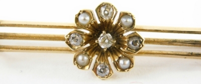 An Art Deco diamond and seed pearl bar brooch, a three bar design with central floral cluster and three leaf clover ends, yellow metal stamped 15ct, with replacement steel pin back, 4.5cm wide, 3.7g all in, boxed. - 2