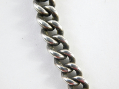 A double watch chain, with two curb links, T-bar and clip, white metal stamped 925, 48cm long, 53.2g all in. - 2