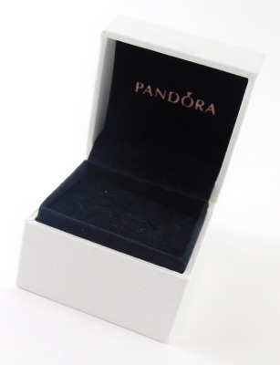 A Pandora dress ring, on plain band with central heart, marked 585, ring size N½, 1.8g. - 2