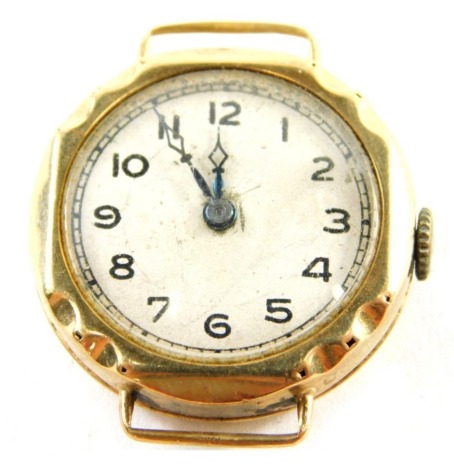 A 9ct gold wristwatch head, with silver coloured numeric dial with blue hands, moulded case, 2.5cm diameter, 12.7g all in.