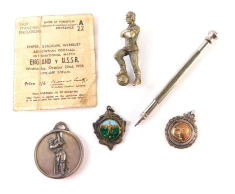 Footballer's Crests, sporting badges, silver and enamel football badge engraved Glen Mauey April 28th 1971, a Wembley 1925 plated pencil case, a GP cricket senior competition scorer 1986 badge, a silver and silver gilt football badge and a model of a foot