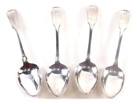 A set of four George IV silver dessert spoons, by TD, Fiddle pattern, initialled, London 1825, 17cm long, 5oz. (4)