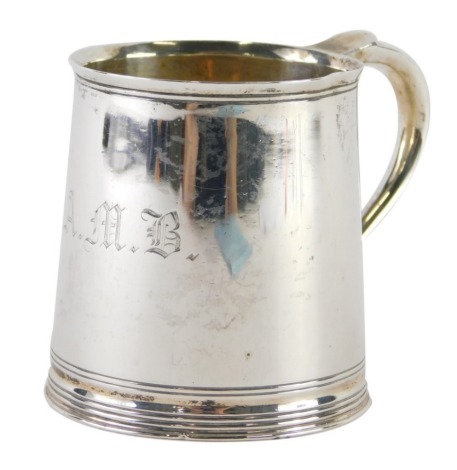 A George VI silver mug, by Roberts & Belk, with tapering body and S scroll ear mould handle, Sheffield 1943, 8cm high, 4.5oz.