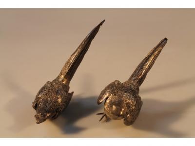 A pair of modern silver pheasants