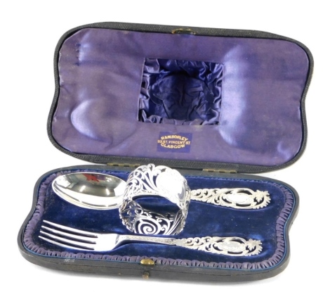 A late Victorian silver Christening set, by Josiah Williams and Co, comprising spoons, fork, and napkin ring, with Sorley retailers label, 3oz, in fitted case, 20cm long.