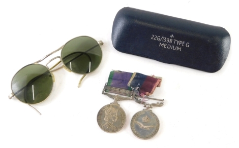 An Elizabeth II Campaign Service and Long Service and Good Conduct medal duo, the first with Northern Ireland clasp, each with partial ribbon similarly marked GT W F Simeon 0040481 123* RAF, and a pair of eye protector spectacles with shaped side bars and