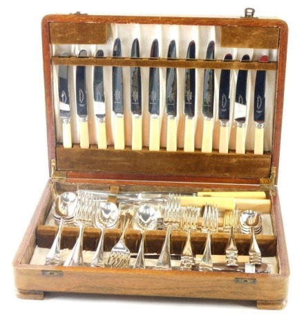 A 20thC Mappin and Webb silver plated canteen of cutlery, place settings for six with faux handles, Old English pattern, in oak canteen, 39cm wide.