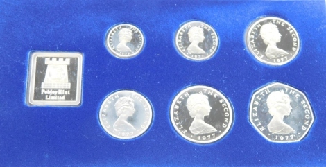 A Pobjoy Mint 1977 silver proof coin set, six coins with forty pound certificate, in blue velvet case and outer box.