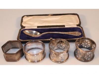 A pair of George V silver napkin rings