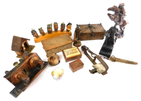 Various treen metalware collectors items etc, an early 20th century iron animal trap, 24cm wide, an early 20th century plough wood plane with metal mounts, a quantity of Norwegian bottle stoppers and other carvings, boxes, figure groups etc (a quantity)